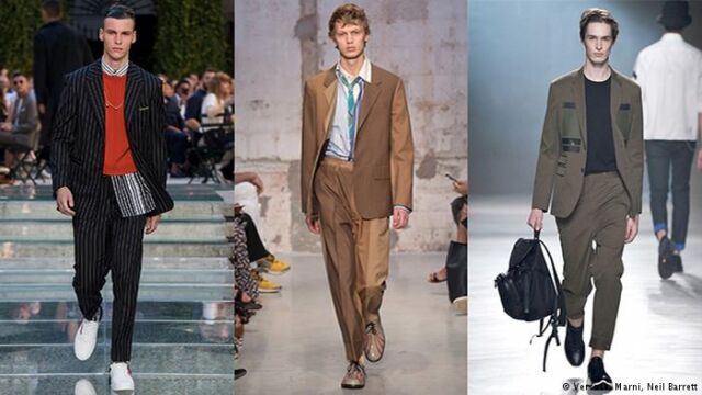 Jak nosić garnitur -
Trudno wyobrazić sobie męską modę bez garnituru. Jednak dzisiaj nosi się go bardziej na luzie bez sztywnych zasad. Marynarki, koszule, kamizelki i spodnie poddane zostały przeróbkom i nosi się je z elementami odzieży sportowej lub tej na czas wolny, zakładając tenisówki i nosząc plecak zamiast aktówki. Modny mężczyzna sięga też po garnitury we wzory. Fot. źródło: dw.de