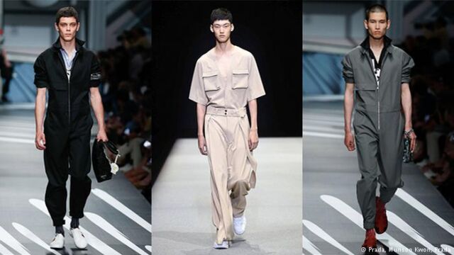 Ubiór do pracy -
Odzież dla zwykłego robotnika w wydaniu Haute Couture robi dziwne wrażenie. Kombinezony dla zamożnej klienteli nie pochodzą ani ze sklepu z ubraniem roboczym, ani ze sklepów dyskontowych z modą, lecz od Prady i Kwona. Czyżby chciano w ten sposób zatrzeć granicę między "my " i "wy"? Fot. Źródło: dw.de